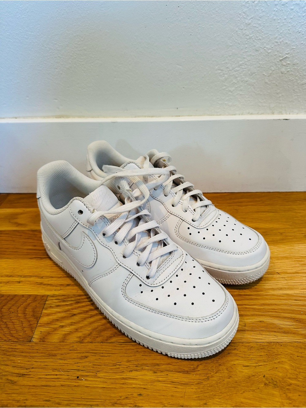 Nike Women’s All-White Low-Top Leather Sneakers